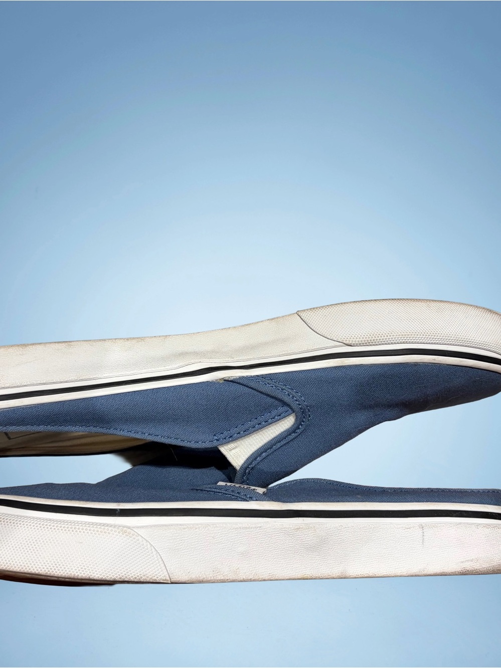 Vans Slip-On Canvas Sneakers in Navy Blue and White